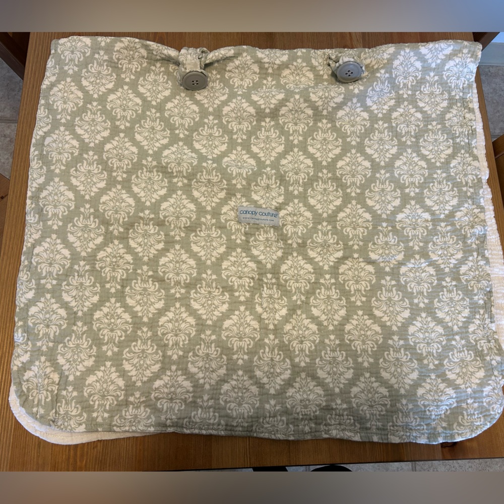 Green and White Quilted Blanket